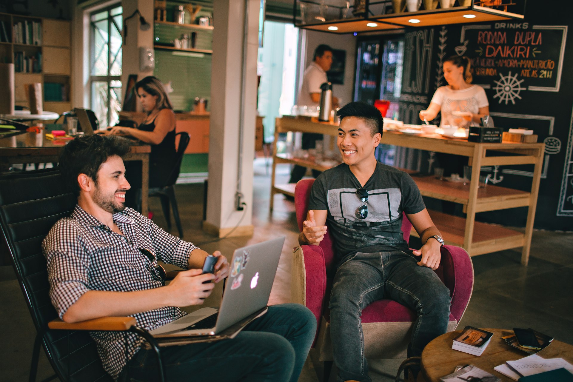 two men laughing white sitting on chairs  spectrautonomie.be